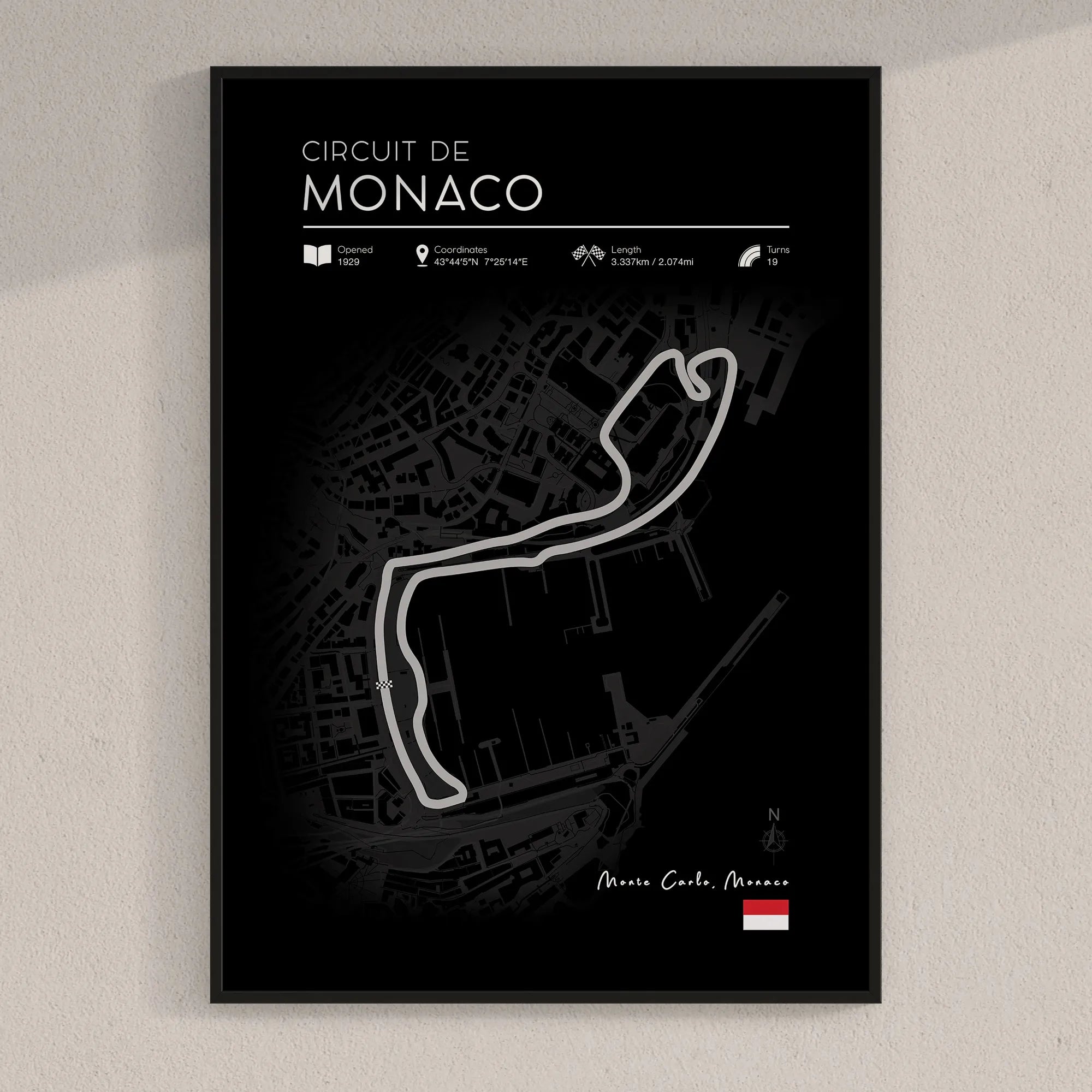 Modern black Formula 1 Monaco race track art print displayed in stylish wooden frame on wall