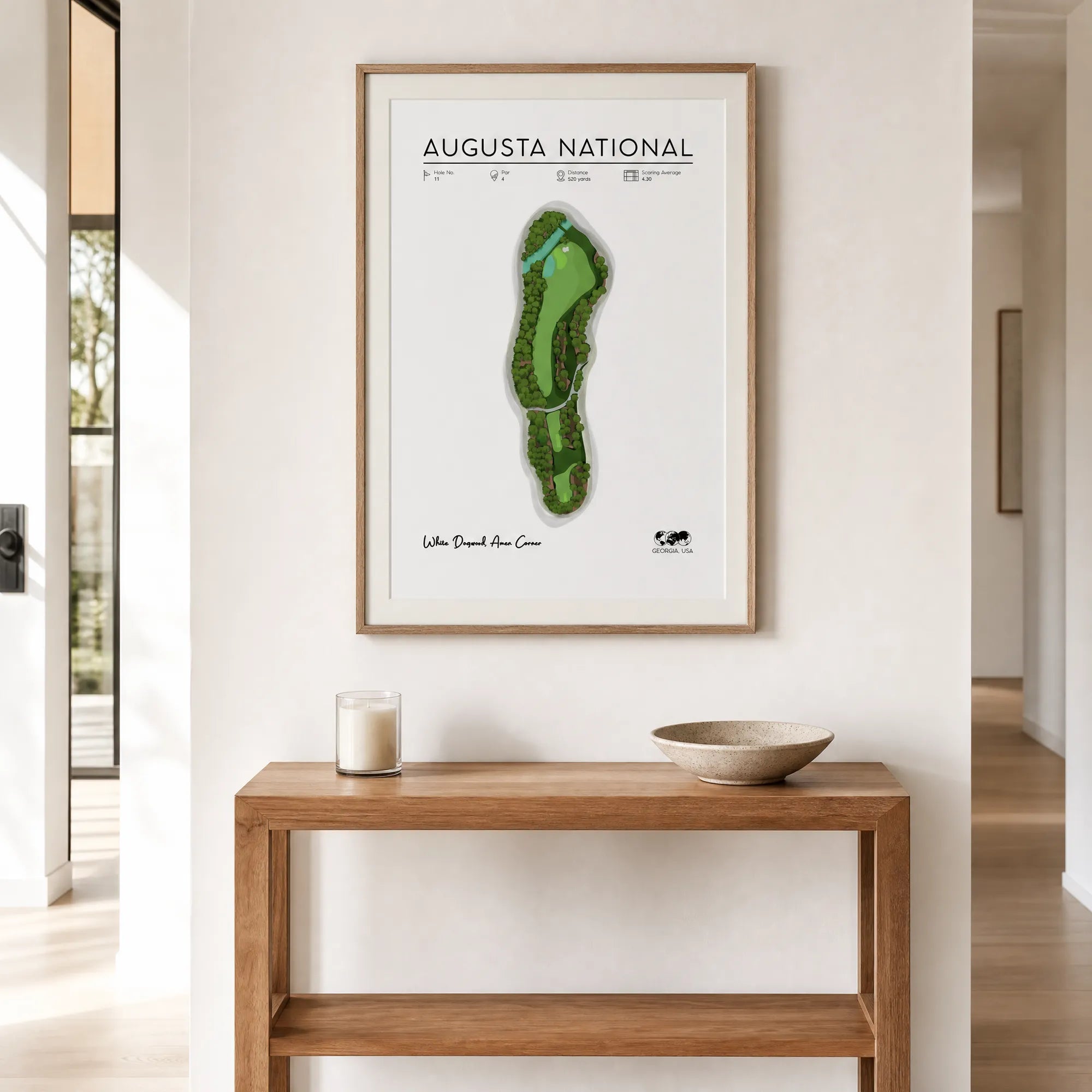 Golf wall decor in a hallway, framed golf course print, light oak frame, white mat, timber console table