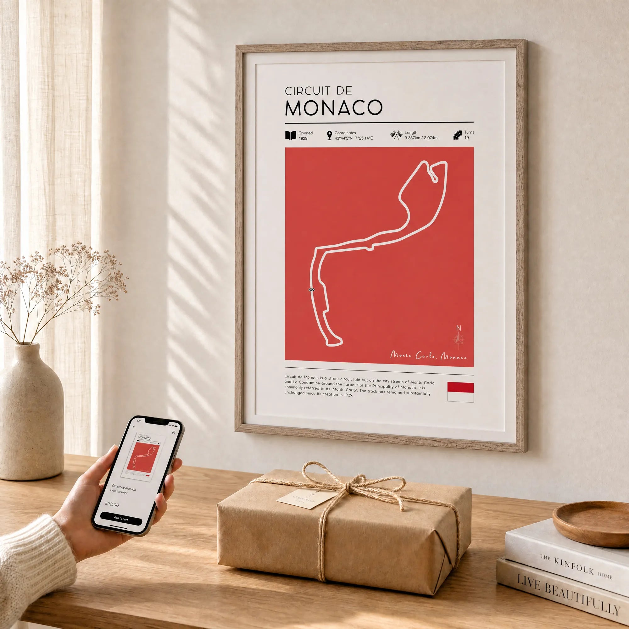 Monaco F1 Circuit wall art print in oak frame gift idea for F1 fan with kraft wrapped present and phone showing product page